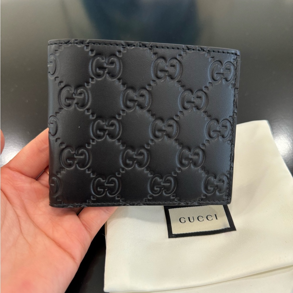 Gucci GG Embossed Men’s Leather Wallet